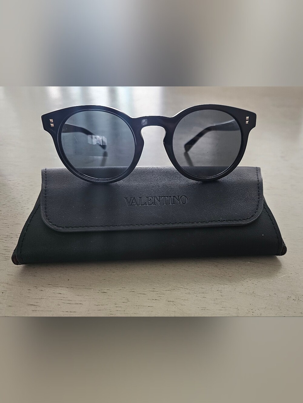 Valentino Black Round Sunglasses with Dark Lenses